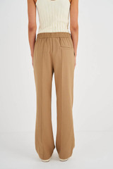 Profile view of model wearing the Oroton Twill Weave Jogger in Brunette and 50% Wool / 50% Polyester for Women