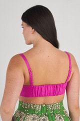 Profile view of model wearing the Oroton Tailored Bralette in Fuchsia and 100% Linen for Women