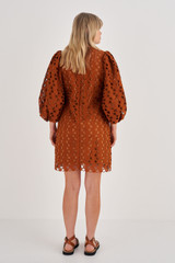Profile view of model wearing the Oroton Lace Dress in Tan and 100% Polyester for Women