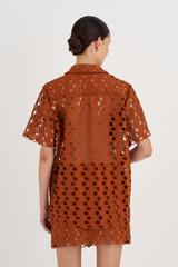 Profile view of model wearing the Oroton Short Sleeve Lace Over Shirt in Tan and 100% Polyester for Women