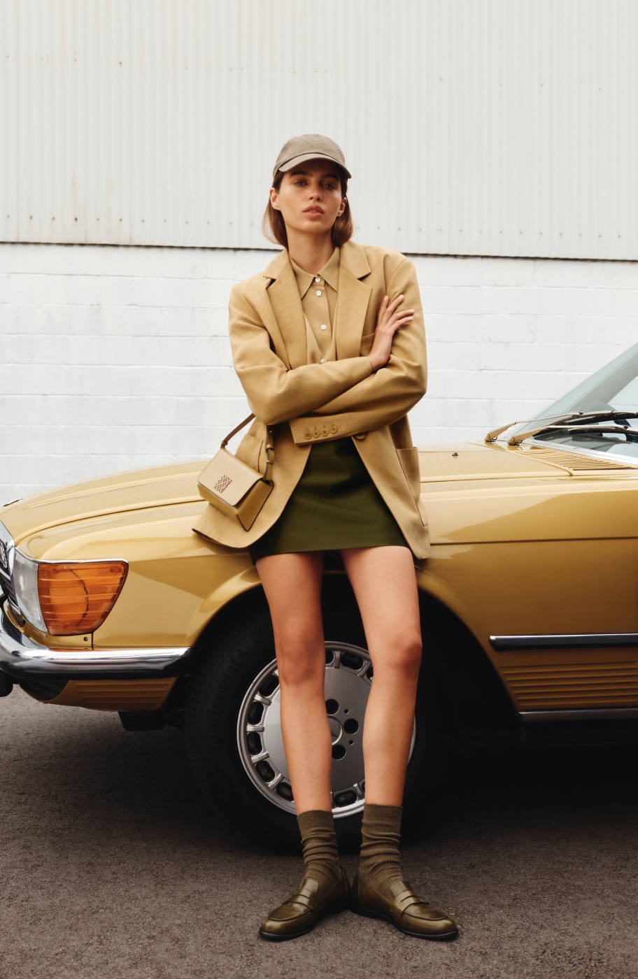 Autumn 2023 Model Wearing Single Breasted Blazer And Satin Mini Skirt
