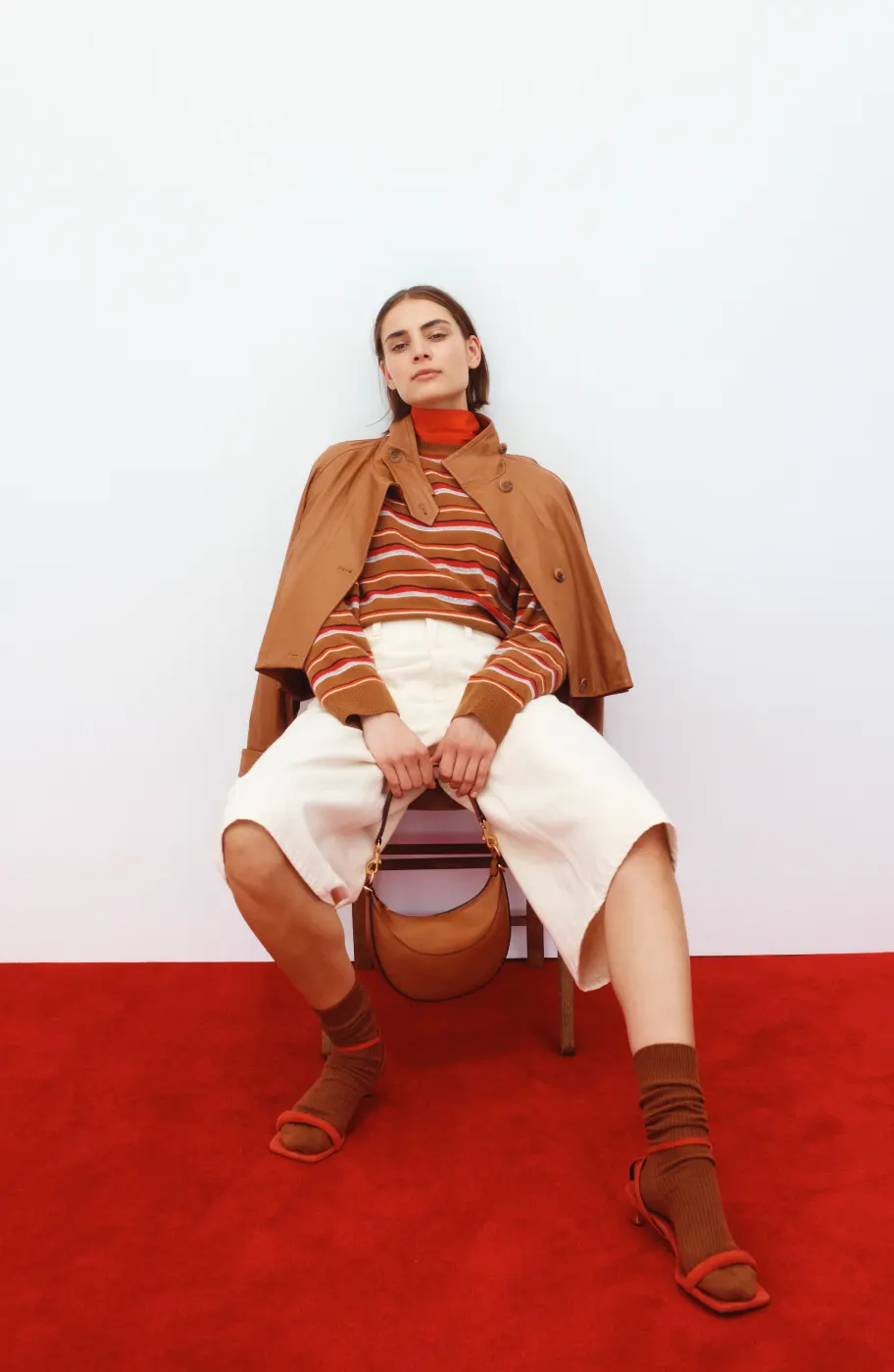 Autumn 2023 Model Wearing Leather Cropped Trench And Merino Longe Sleeve Stripe Crew Knit