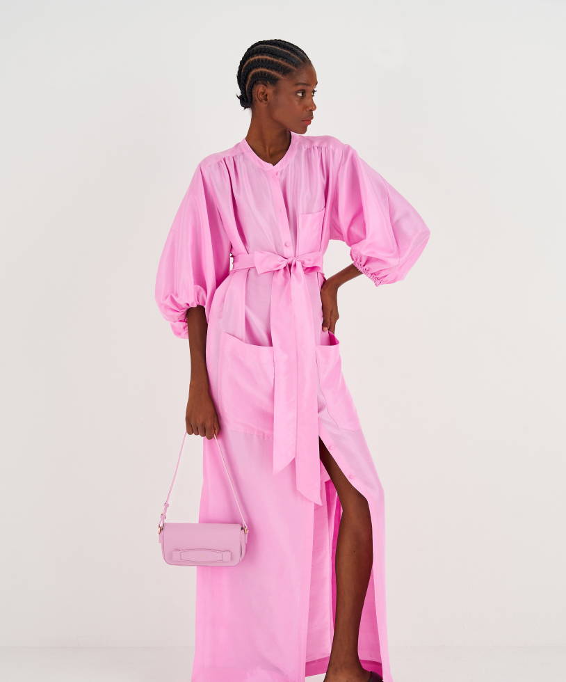 Model wears Oroton Column Shirt Dress in Pink