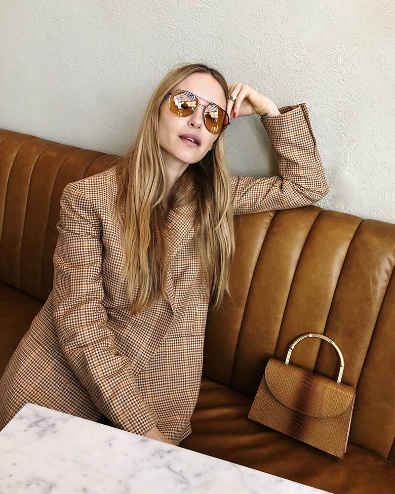 Pernille Teisbaek with the Oroton Grace Top Handle Clutch and Oroton Cotton-Linen Houndstooth Blazer