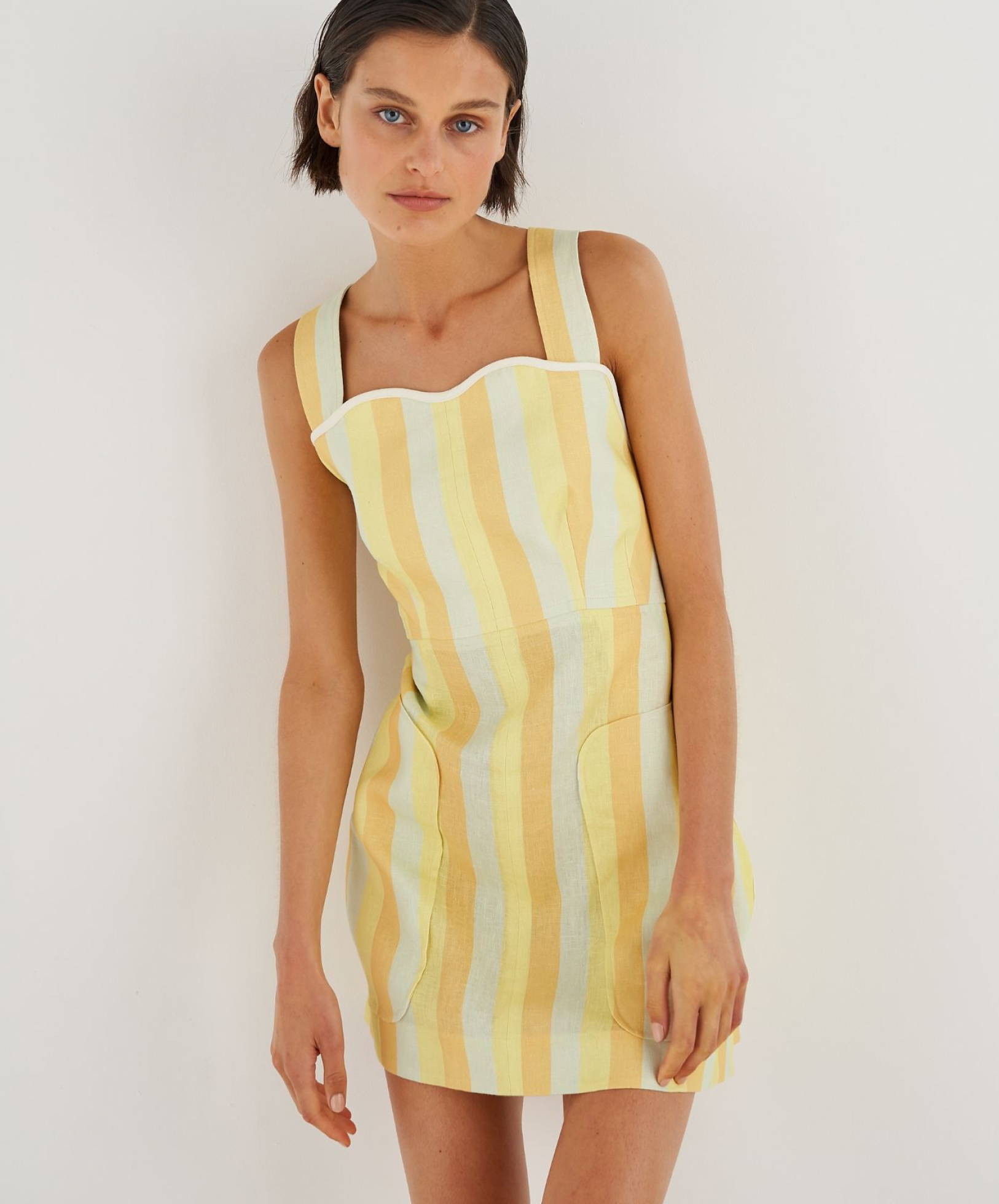 Model wearing Stripe Apron Dress